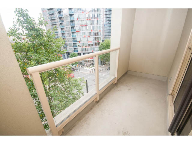 Balcony with city view and modern railings. - 602 - 819 Hamilton Street, Vancouver Downtown