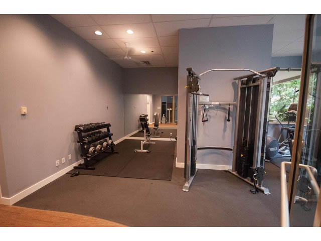 Bright gym with hardwood floors and city view. - 602 - 819 Hamilton Street, Vancouver Downtown