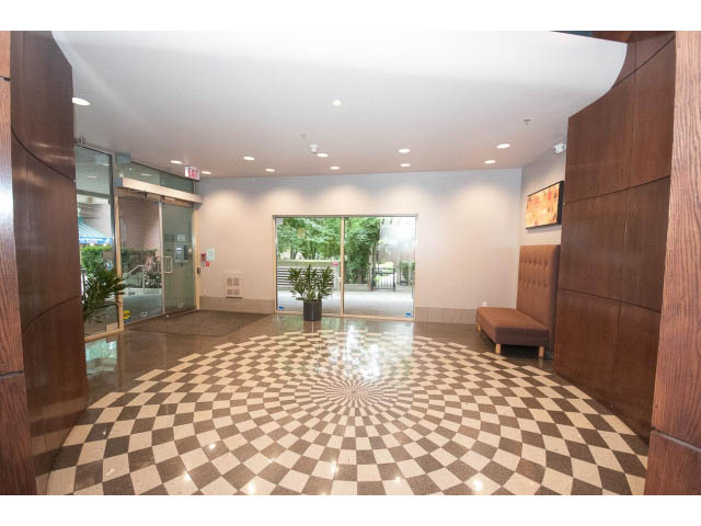 Furnished living room with checkered floor and large windows. - 602 - 819 Hamilton Street, Vancouver Downtown