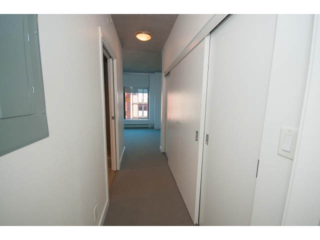 Spacious hallway with sliding doors and natural light. - 803 - 128 Cordova St W, Vancouver Downtown