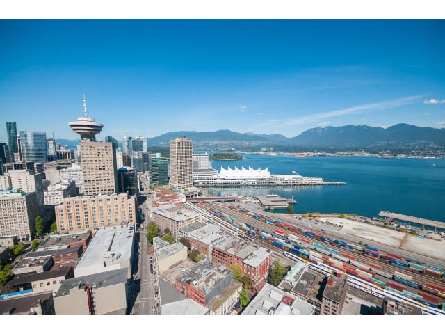 Bright living room with stunning city view and waterfront access. - 803 - 128 Cordova St W, Vancouver Downtown
