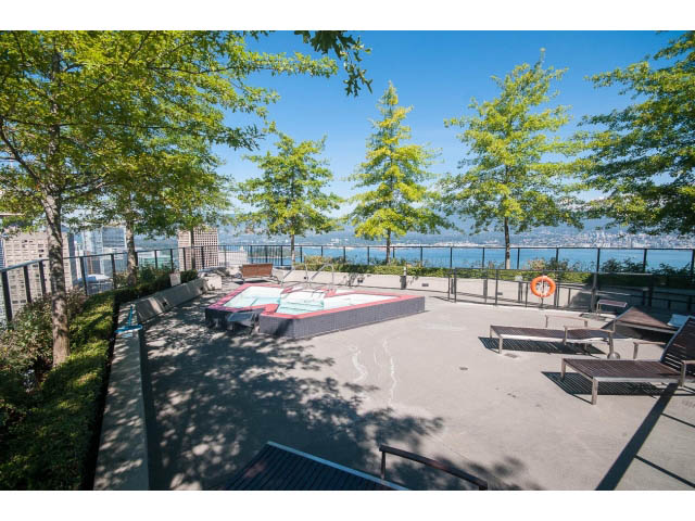 Bright living room with city view and outdoor patio. - 803 - 128 Cordova St W, Vancouver Downtown
