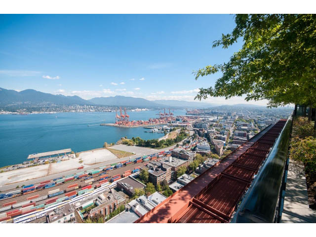 Bright living room with stunning city view and modern furnishings. - 803 - 128 Cordova St W, Vancouver Downtown