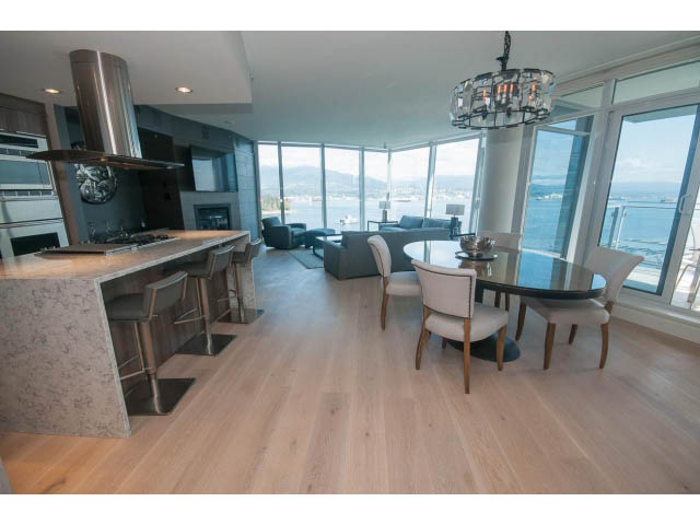 Bright kitchen with marble countertops, hardwood floors, and a stunning city view. - 1702 - 1281 W. Cordova Street, Vancouver Downtown