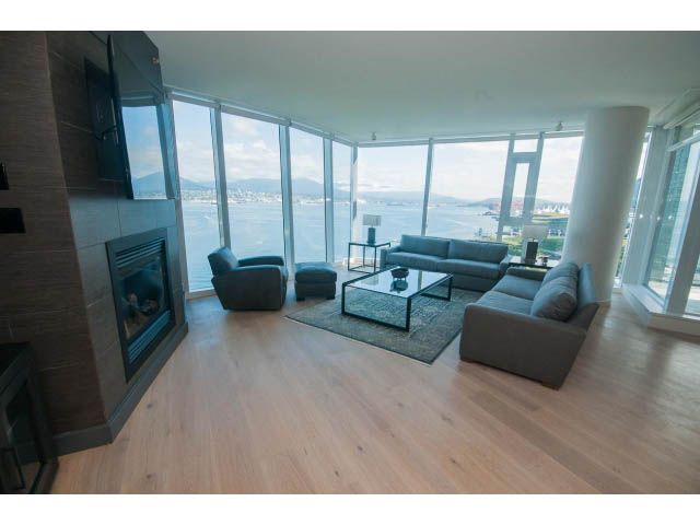 Spacious living room with hardwood floors, city view, and modern furnishings. - 1702 - 1281 W. Cordova Street, Vancouver Downtown
