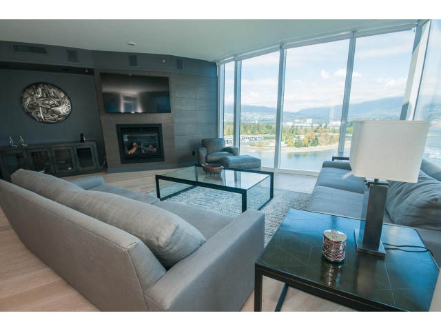 Spacious living room with city view, modern furniture, and large windows. - 1702 - 1281 W. Cordova Street, Vancouver Downtown