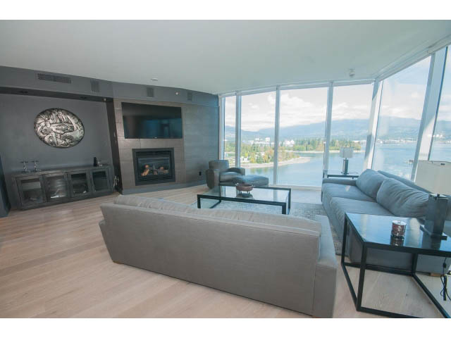 Spacious living room with large windows, city view, and modern furniture. - 1702 - 1281 W. Cordova Street, Vancouver Downtown