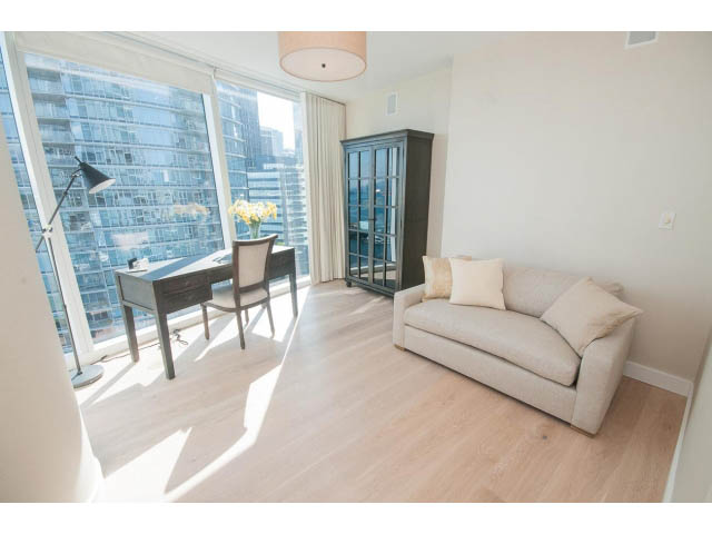 Bright living room with hardwood floors, city view, and modern furnishings. - 1702 - 1281 W. Cordova Street, Vancouver Downtown