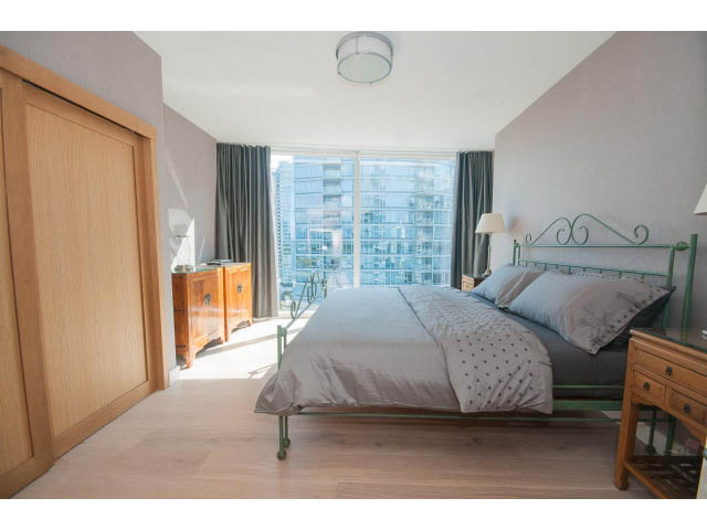 Bright bedroom with hardwood floors, city view, and modern furnishings. - 1702 - 1281 W. Cordova Street, Vancouver Downtown