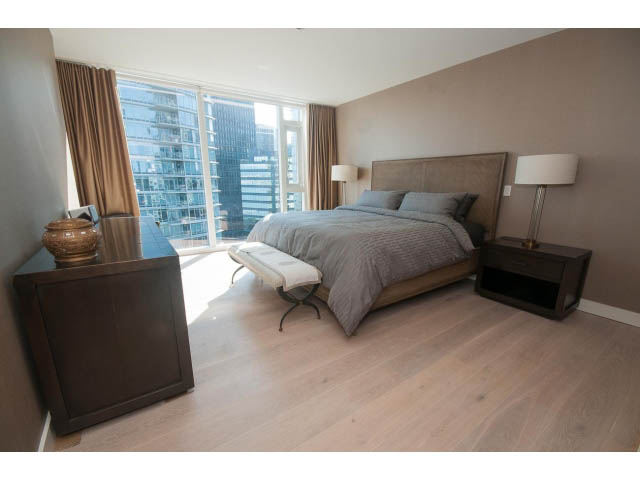 Spacious bedroom with hardwood floors, large windows, and a city view. - 1702 - 1281 W. Cordova Street, Vancouver Downtown