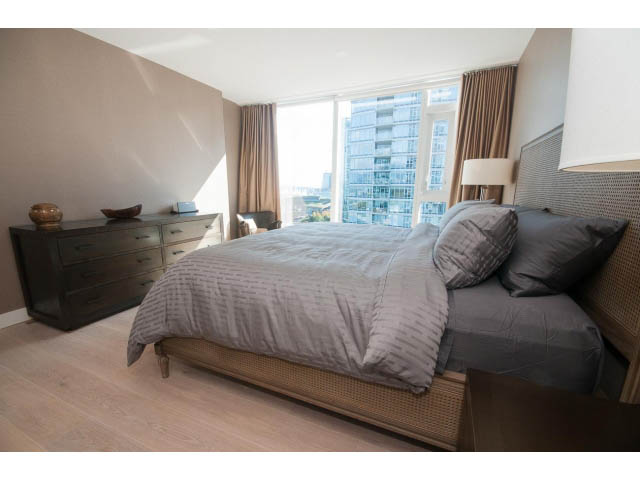 Spacious bedroom with hardwood floors, large windows, and a city view. - 1702 - 1281 W. Cordova Street, Vancouver Downtown