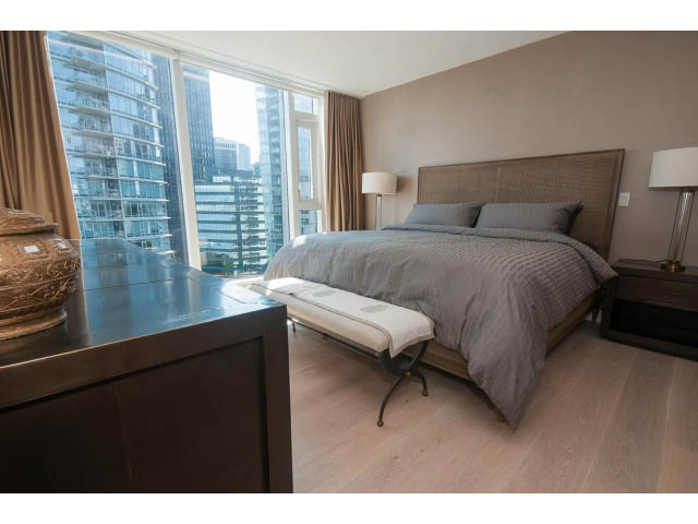 Spacious bedroom with hardwood floors, city view, and modern furnishings. - 1702 - 1281 W. Cordova Street, Vancouver Downtown