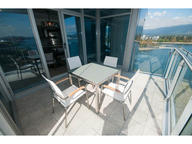 Bright living room with large windows, city view, and modern furniture. - 1702 - 1281 W. Cordova Street, Vancouver Downtown