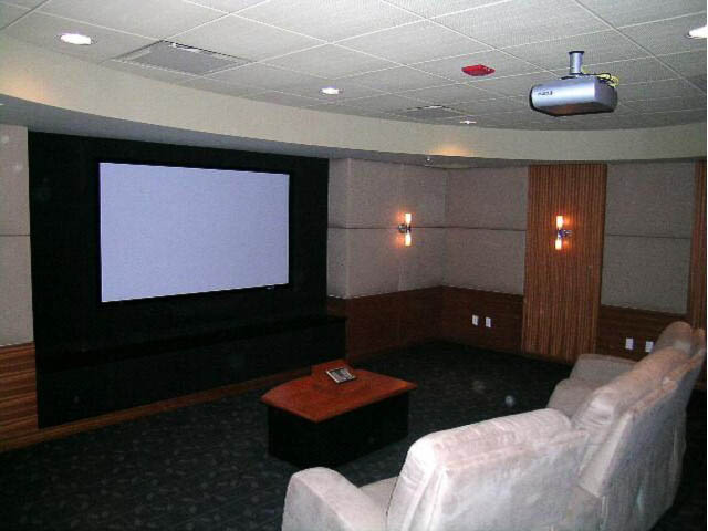 Living room with a large projection screen and comfortable seating. - 1702 - 1281 W. Cordova Street, Vancouver Downtown
