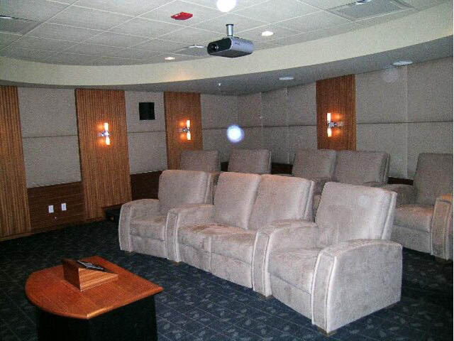Entertainment room with reclining seats and projector, cozy ambiance. - 1702 - 1281 W. Cordova Street, Vancouver Downtown