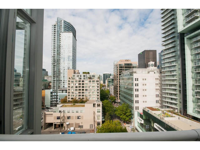 Bright living room with stunning city view and modern furnishings. - 1202 - 480 Robson Street, Vancouver Downtown