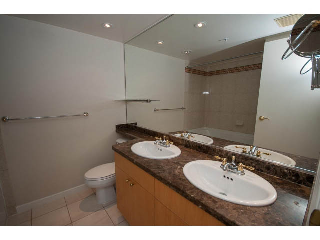 Furnished bathroom with granite countertops and modern fixtures. - 707 - 1288 Marinaside Crescent, Vancouver Downtown