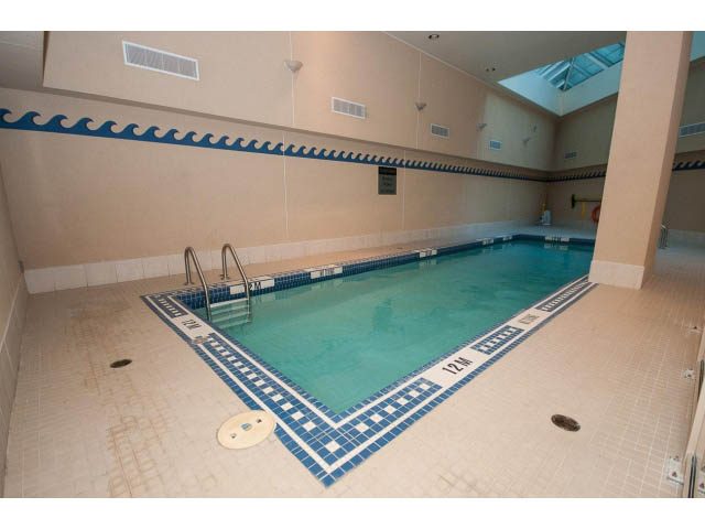 Furnished indoor pool with tiled floors and skylights. - 707 - 1288 Marinaside Crescent, Vancouver Downtown