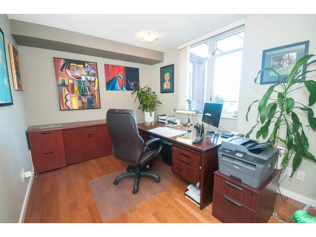 Furnished office with hardwood floors, desk, chair, and artwork on walls. - 603 - 1425 West 6th Ave, Vancouver West Side