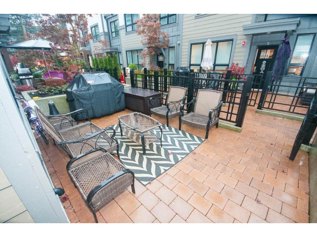 Furnished patio with outdoor furniture and brick flooring. - 9 - 3508 Mount Seymour Pkwy, North Vancouver