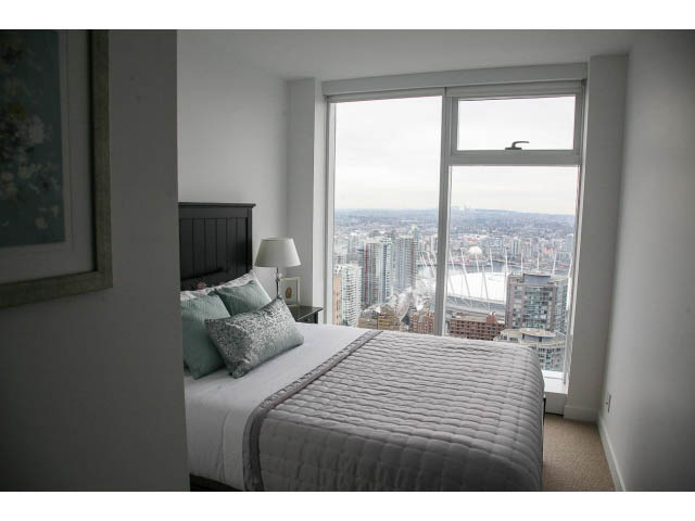 Furnished 2-bedroom bedroom with city view and large windows. - 4609 - 777 Richards St, Vancouver Downtown