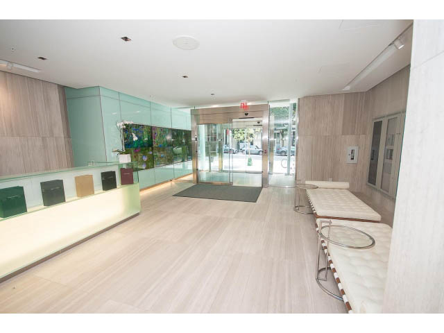 Spacious living room with hardwood floors and modern decor. - 4609 - 777 Richards St, Vancouver Downtown