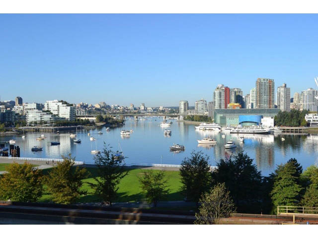 Bright living room with stunning city view and waterfront access. - 706 - 1088 Quebec St., Vancouver East Side