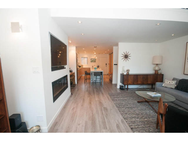 Spacious living room with hardwood floors and modern decor. - 15 - 2151 Banbury Rd, North Vancouver