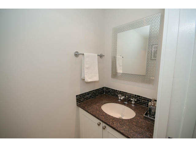 Bathroom with granite countertop and modern mirror. - 2407 - 1723 Alberni, Vancouver Downtown