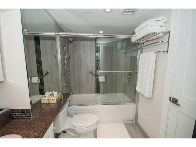 Bright bathroom with granite countertops and a walk-in shower. - 2407 - 1723 Alberni, Vancouver Downtown