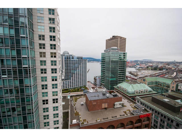 Bright living room with city view and modern furnishings. - 1902 - 838 W Hastings, Vancouver Downtown