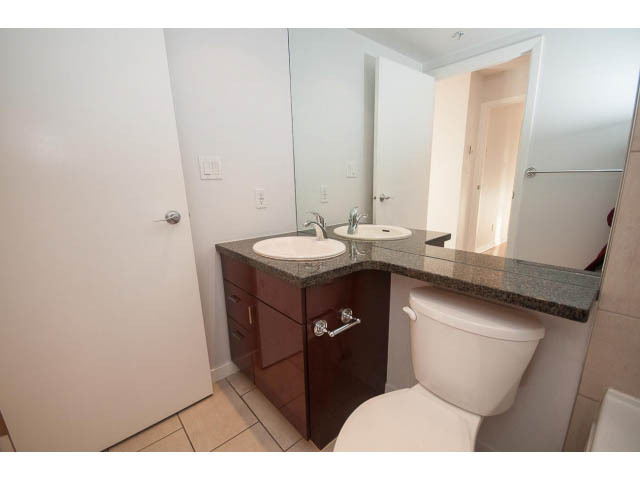 Bathroom with granite countertops and a modern sink. - 2005 - 1067 Marinaside Crescen, Vancouver Downtown