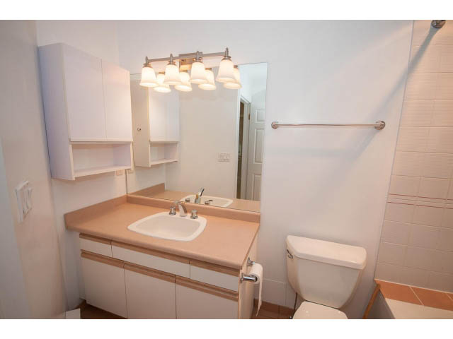 Furnished bathroom with light wood countertops and modern fixtures. - 1962 West 11th Ave, Vancouver West Side