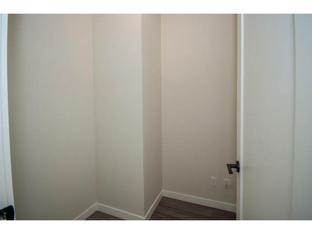 Bright and clean living room with white walls and hardwood floors. - 317 - 311 East 6th Avenue, Vancouver East Side