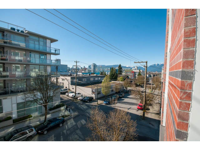 Bright balcony with city view and modern furnishings. - 317 - 311 East 6th Avenue, Vancouver East Side