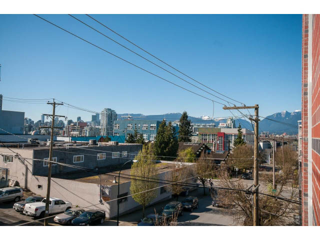 Bright balcony with city view and power lines. - 317 - 311 East 6th Avenue, Vancouver East Side