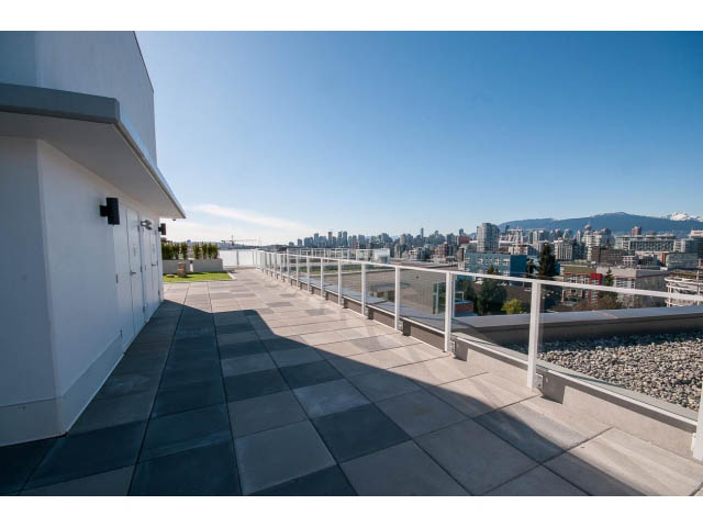 Bright rooftop patio with city view and modern furnishings. - 317 - 311 East 6th Avenue, Vancouver East Side