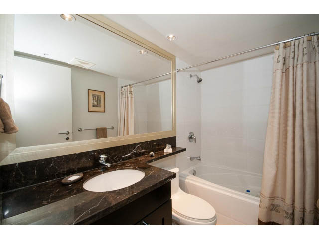 Furnished 1-bedroom + den with marble countertops and a modern bathroom. - 502 - 590 Nicola Street, Vancouver Downtown