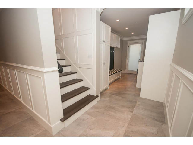 Furnished entryway with white wainscoting and tiled flooring. - 3921 West 10th, Vancouver West Side