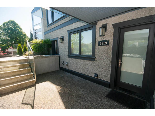 Furnished entryway with stone steps and modern glass door. - 3921 West 10th, Vancouver West Side