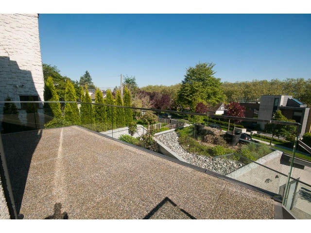 Furnished living room with panoramic city view and modern decor. - 3921 West 10th, Vancouver West Side