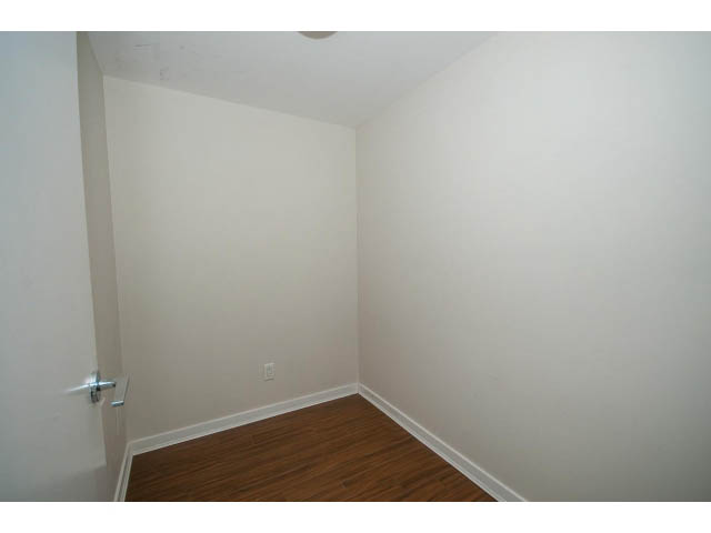 Empty den with hardwood floors and white walls. - 3006 - 188 Keefer Place, Vancouver Downtown