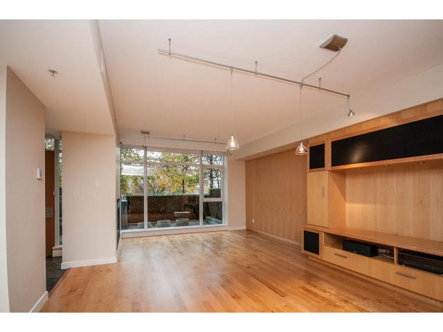 Spacious living room with hardwood floors and modern track lighting. - TH17 - 1233 West Cordova St, Vancouver Downtown