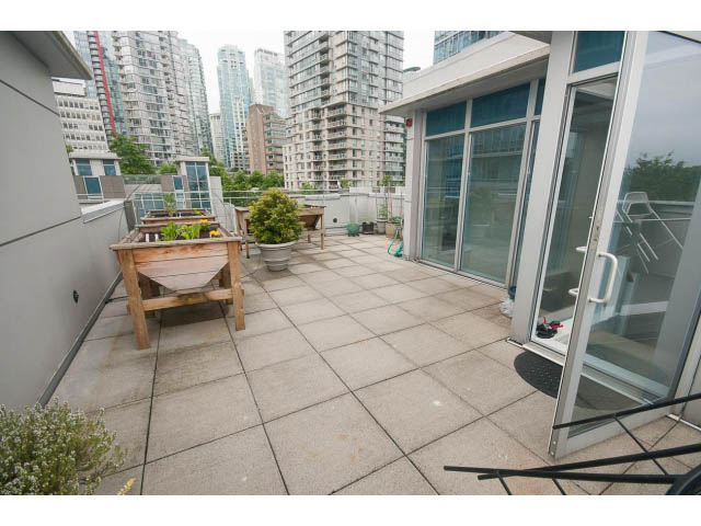 Furnished patio with city view and outdoor seating area. - TH17 - 1233 West Cordova St, Vancouver Downtown