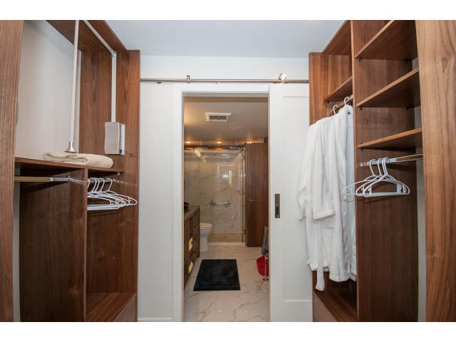 Furnished 2-bedroom condo with modern closet and marble bathroom. - 307 - 1490 Pennyfarthing Drive, Vancouver West Side
