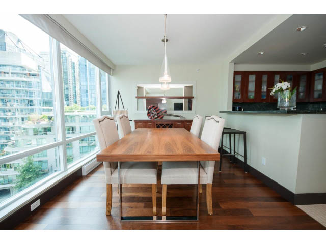 Bright kitchen with hardwood floors, city view, and modern furnishings. - 803 - 590 Nicola Street, Vancouver Downtown