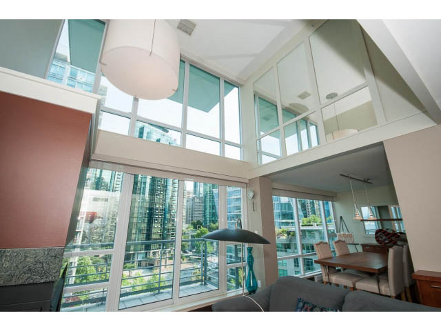 Spacious loft with high ceilings, large windows, and a city view. - 803 - 590 Nicola Street, Vancouver Downtown