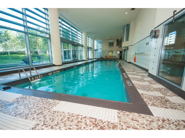 Spacious loft with large windows, modern tiled floor, and a large indoor pool area. - 803 - 590 Nicola Street, Vancouver Downtown