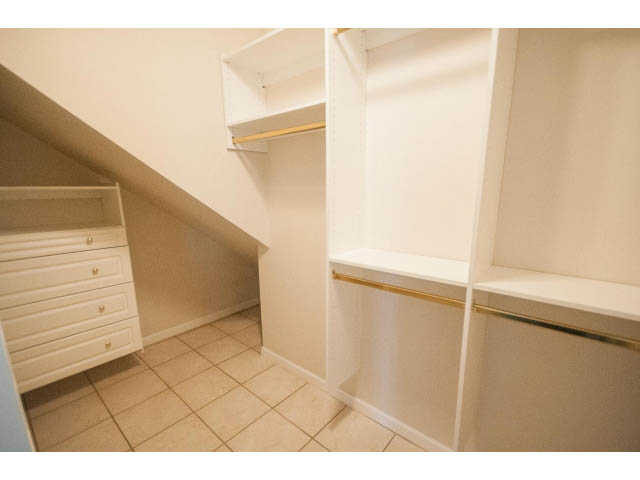 Furnished den with built-in shelving and tiled floor. - 1122 Ironwork Passage, Vancouver West Side