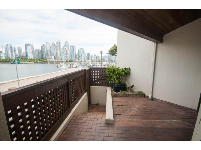 Furnished patio with brick flooring and city view. - 1122 Ironwork Passage, Vancouver West Side